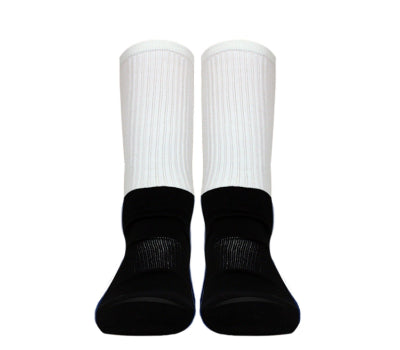 A pair of white socks with black accents on the tips and heels